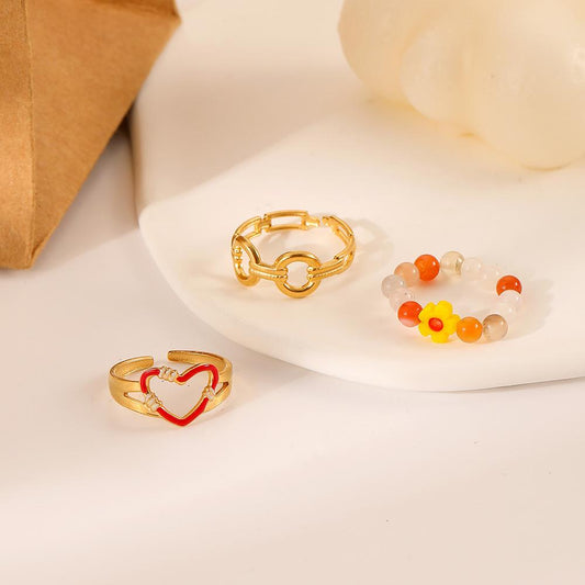 Personality light luxury niche fashion candy color stainless steel love circle small flower open ring set female