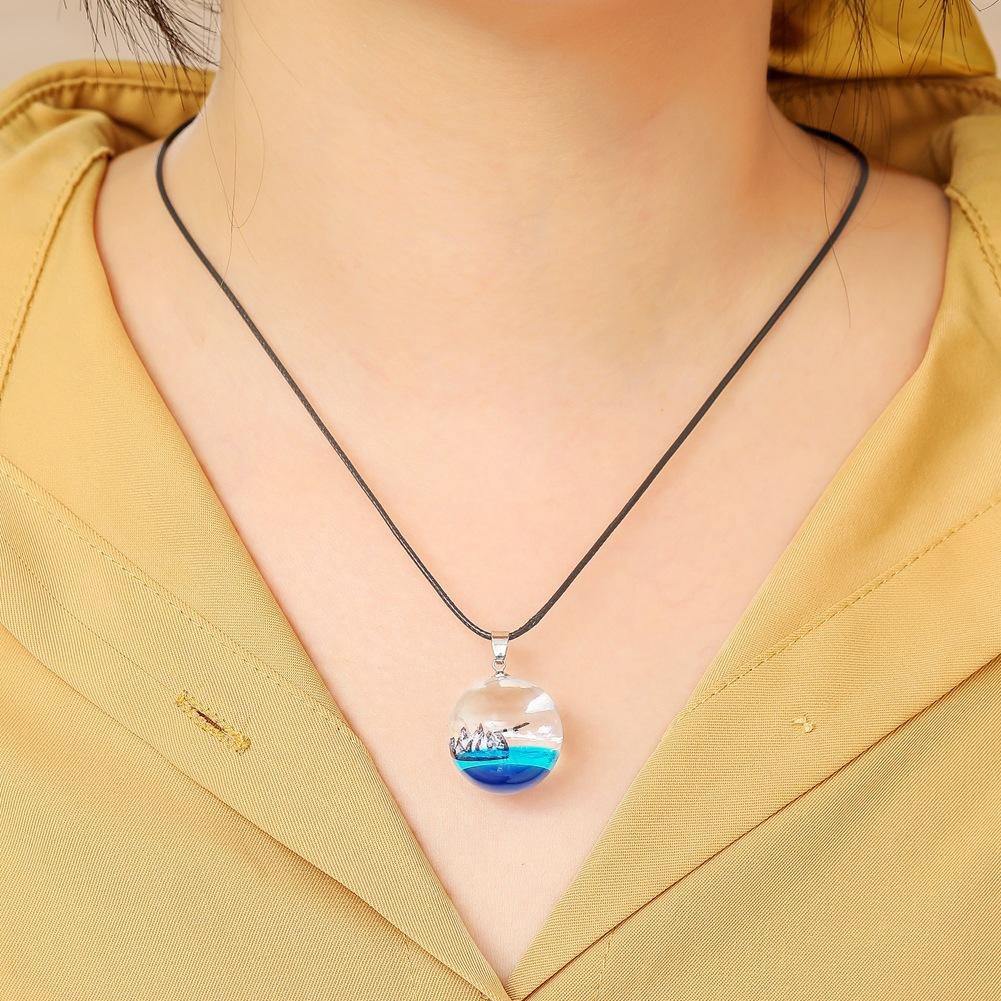 Ins creative handmade jewelry blue sky and white clouds eagle mountain luminous resin necklace