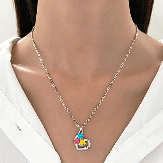 Ins color diamond love jewelry set female fashion temperament niche design hollow heart-shaped necklace earrings tide