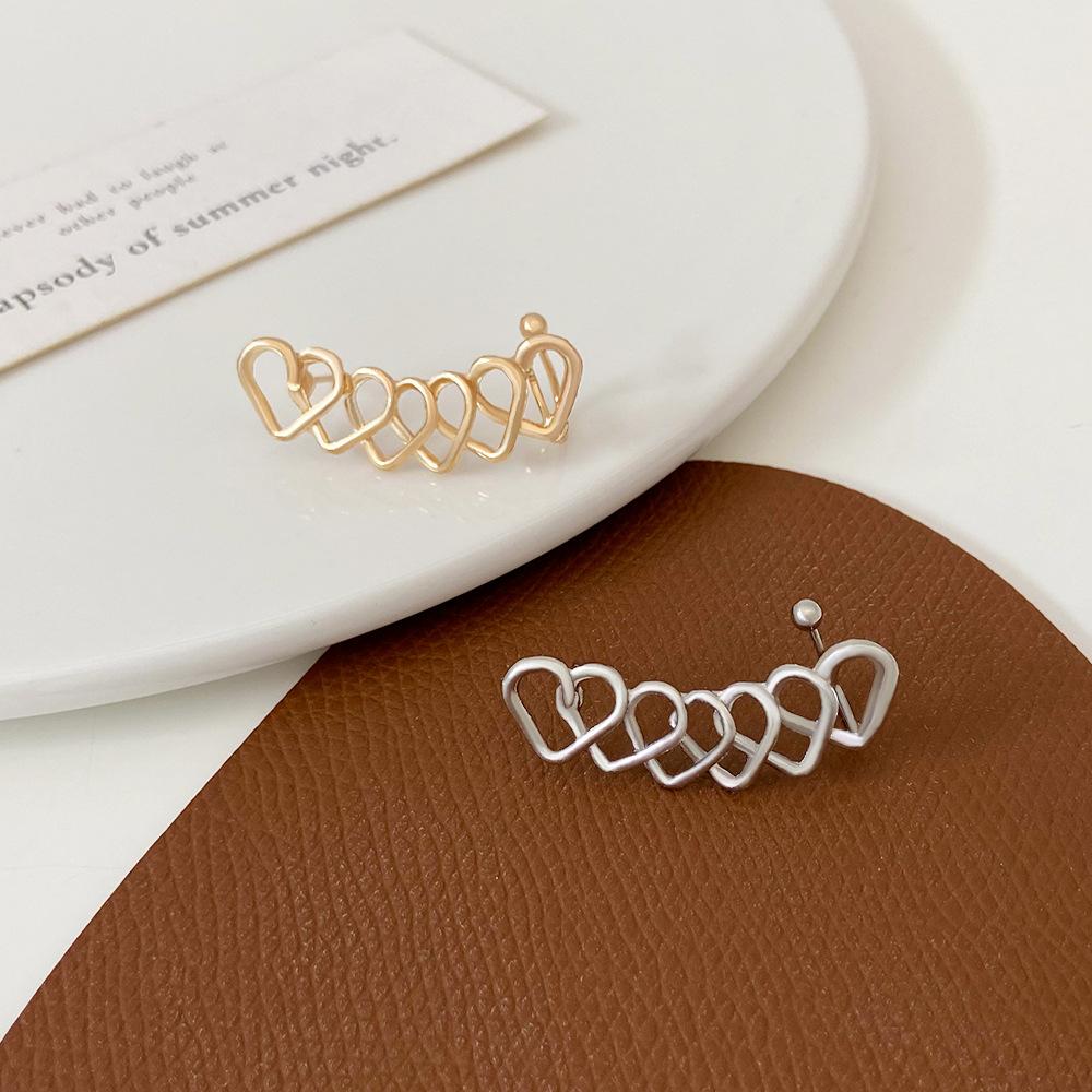 High-end geometric heart ear bone clip earrings retro net red one-piece French style pierced earrings for women