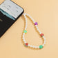 Jewelry Bohemian holiday imitation pearl fruit mobile phone chain sweet and cool temperament soft pottery accessories