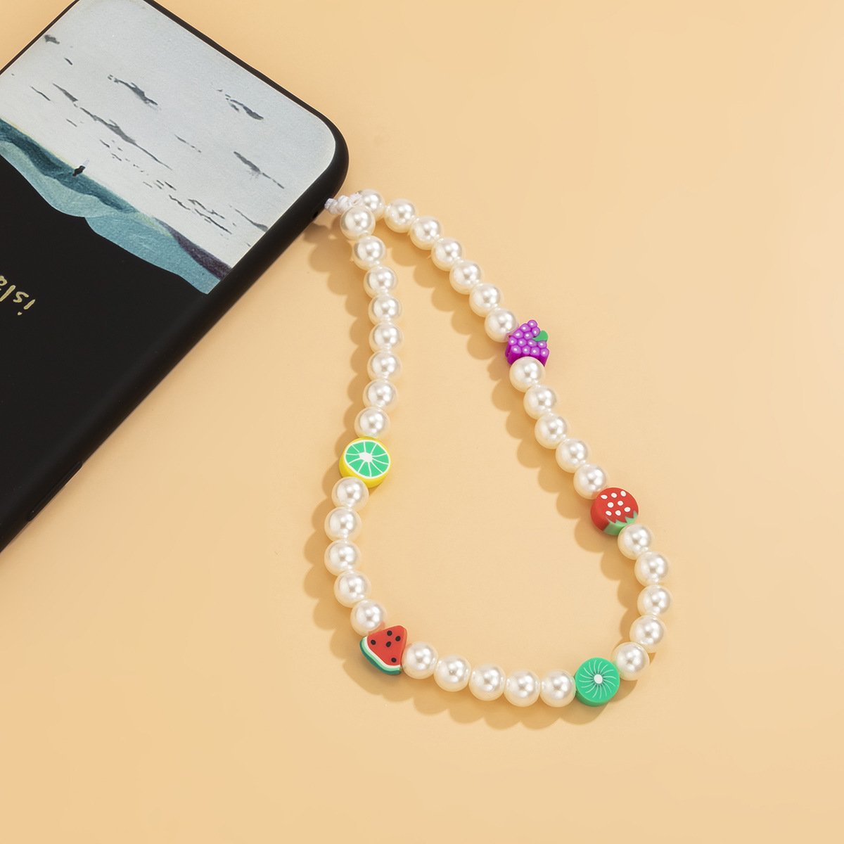 Jewelry Bohemian holiday imitation pearl fruit mobile phone chain sweet and cool temperament soft pottery accessories
