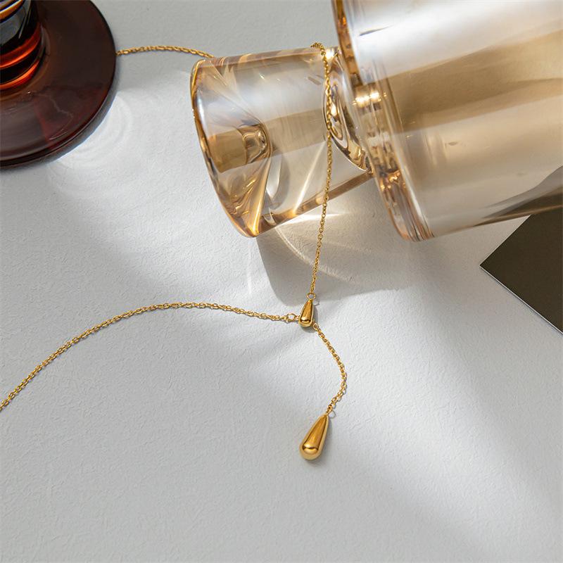 Ins titanium steel gold-plated design sense water drop temperament necklace female light luxury fashion simple collarbone chain necklace