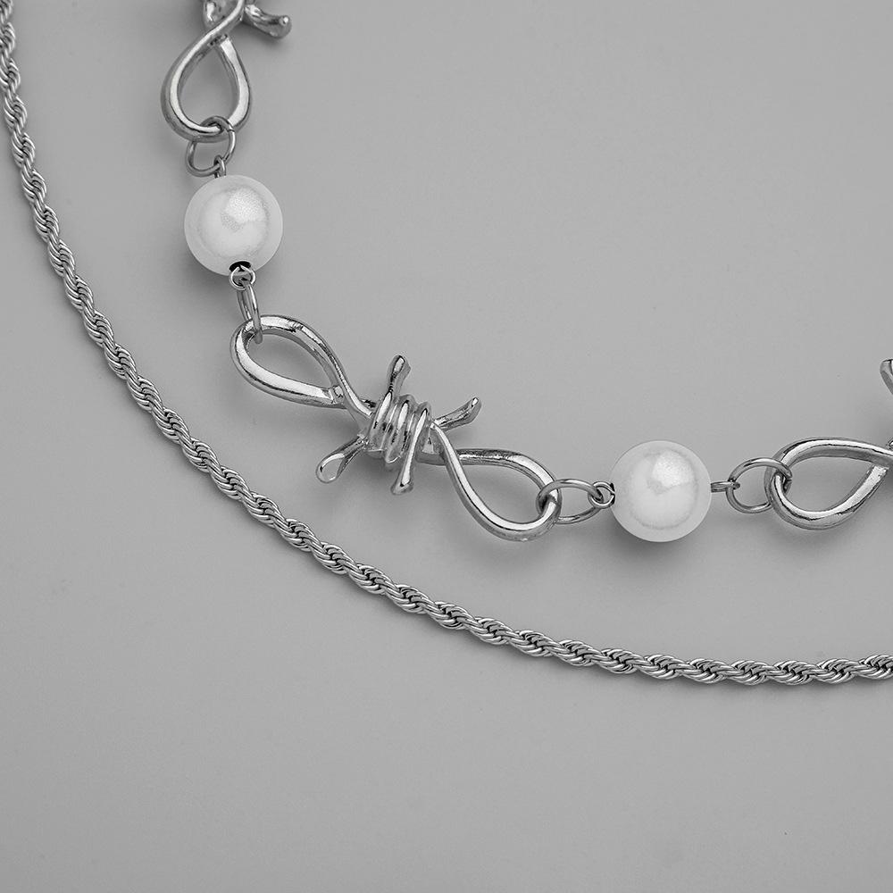 Exaggerated personality thorns splicing key chain reflective pearl stacked necklace twist Cuban clavicle chain