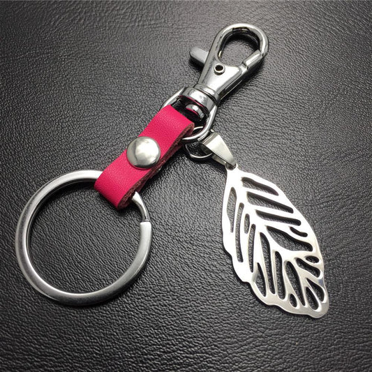 Hollow out leaves titanium steel jewelry accessories cowhide key chain 316 stainless steel men's waist hanging women's bag pendant