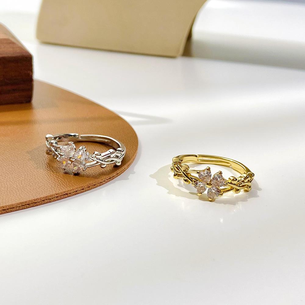 Retro micro-inlaid zircon four-leaf clover ring female fashion personality vine winding adjustable flower index finger ring