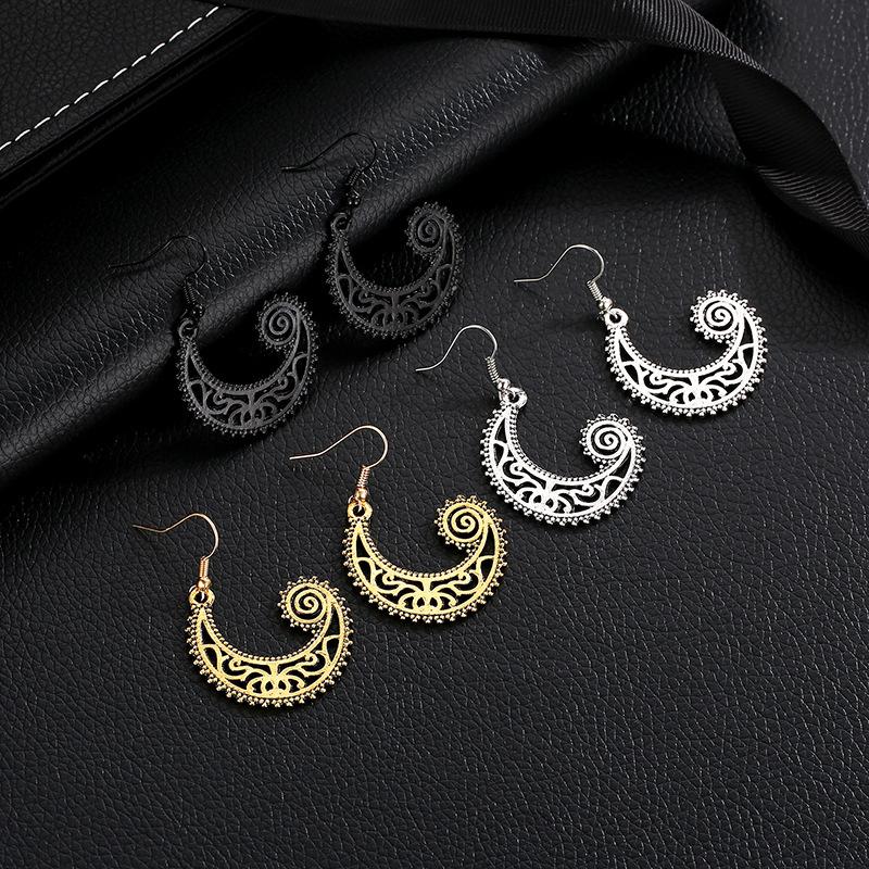 Ins creative earrings retro carved moon hook earrings female wave spiral earrings jewelry