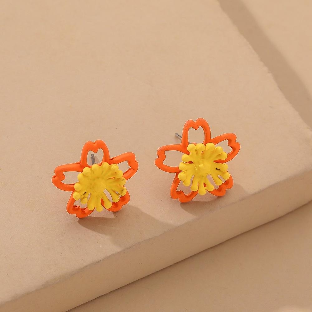 Taobao hollow small flower two-color stud earrings colorful flower paint earrings 925 silver needles