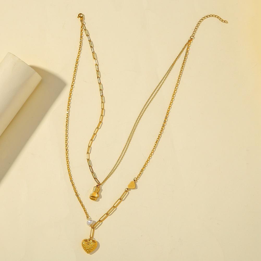 Fashion personality simple stainless steel double-layer boxing gloves knock pattern heart necklace peach heart pendant jewelry female