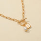 Ins jewelry creative simple OT buckle freshwater pearl love lock pendant fashion retro necklace female