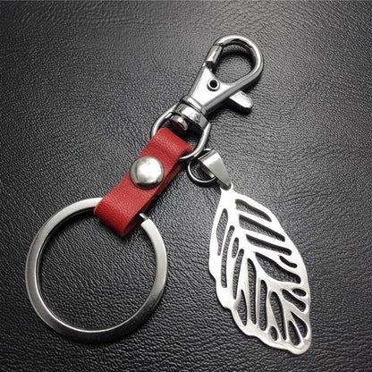 Hollow out leaves titanium steel jewelry accessories cowhide key chain 316 stainless steel men's waist hanging women's bag pendant