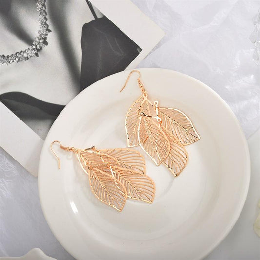 Ethnic retro women's earrings simple hollowed out multi-layered leaf earrings earrings long tassel earrings