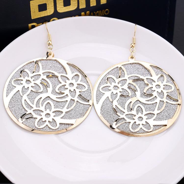 Popular element star with the same round swirling pattern swing earrings fashion frosted earrings direct supply