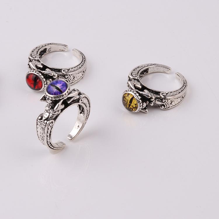 Fashion ring personality male and female models inlaid skull three-dimensional multi-color magic eye personality ring