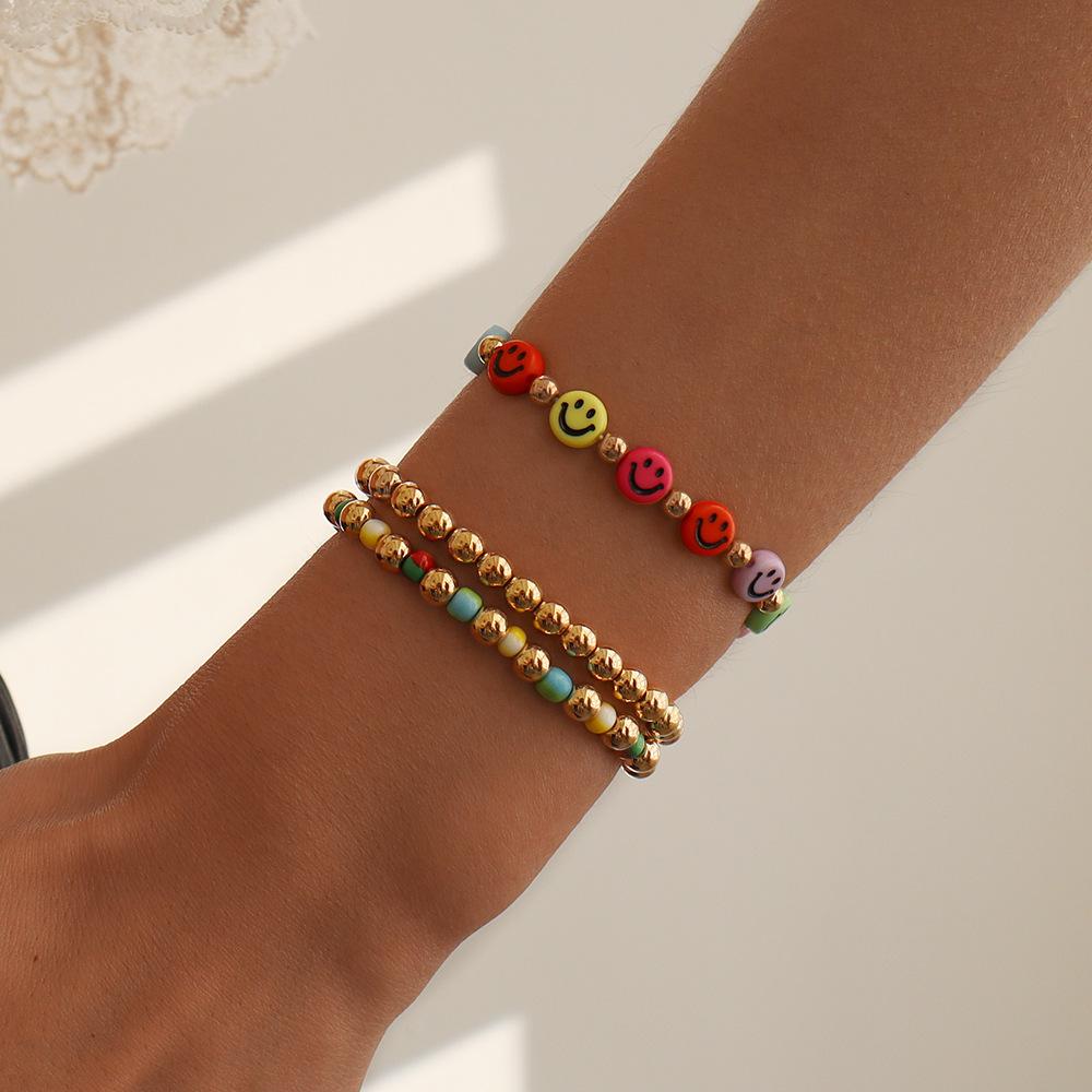 B1623 Internet celebrity elastic hand rope female star smiling face small gold beads beaded bracelet vacation ethnic jewelry