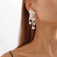 E1994 Creative hand-woven rice bead resin earrings niche design cold flower earrings