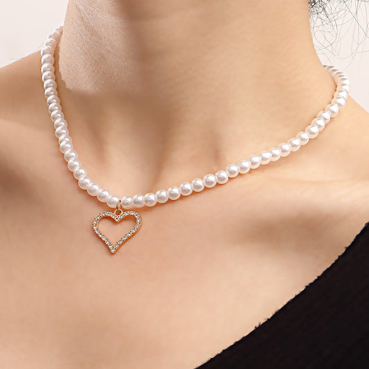 Jewelry light luxury imitation Baroque pearl micro-inlaid diamond hollow heart necklace female trend accessories