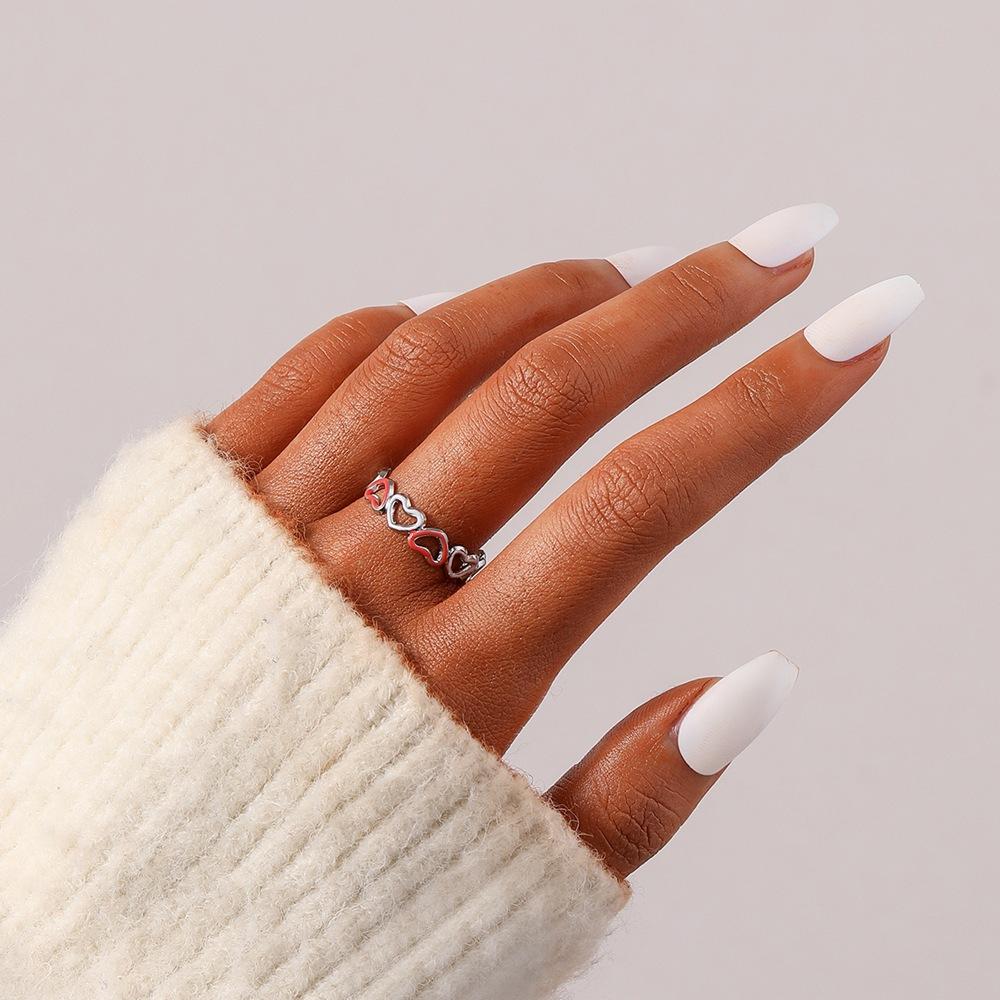 Small and exquisite women's stainless steel creative opening adjustable hollow heart ring