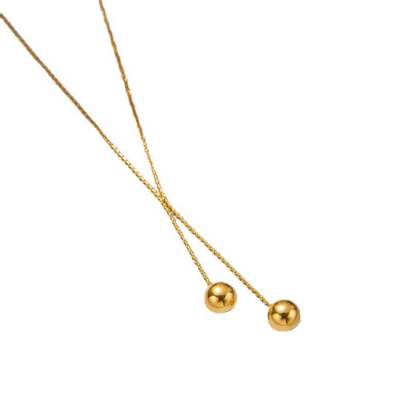 Autumn and winter tassel ball sweater chain retro titanium steel gold-plated ins long necklace jewelry high-end