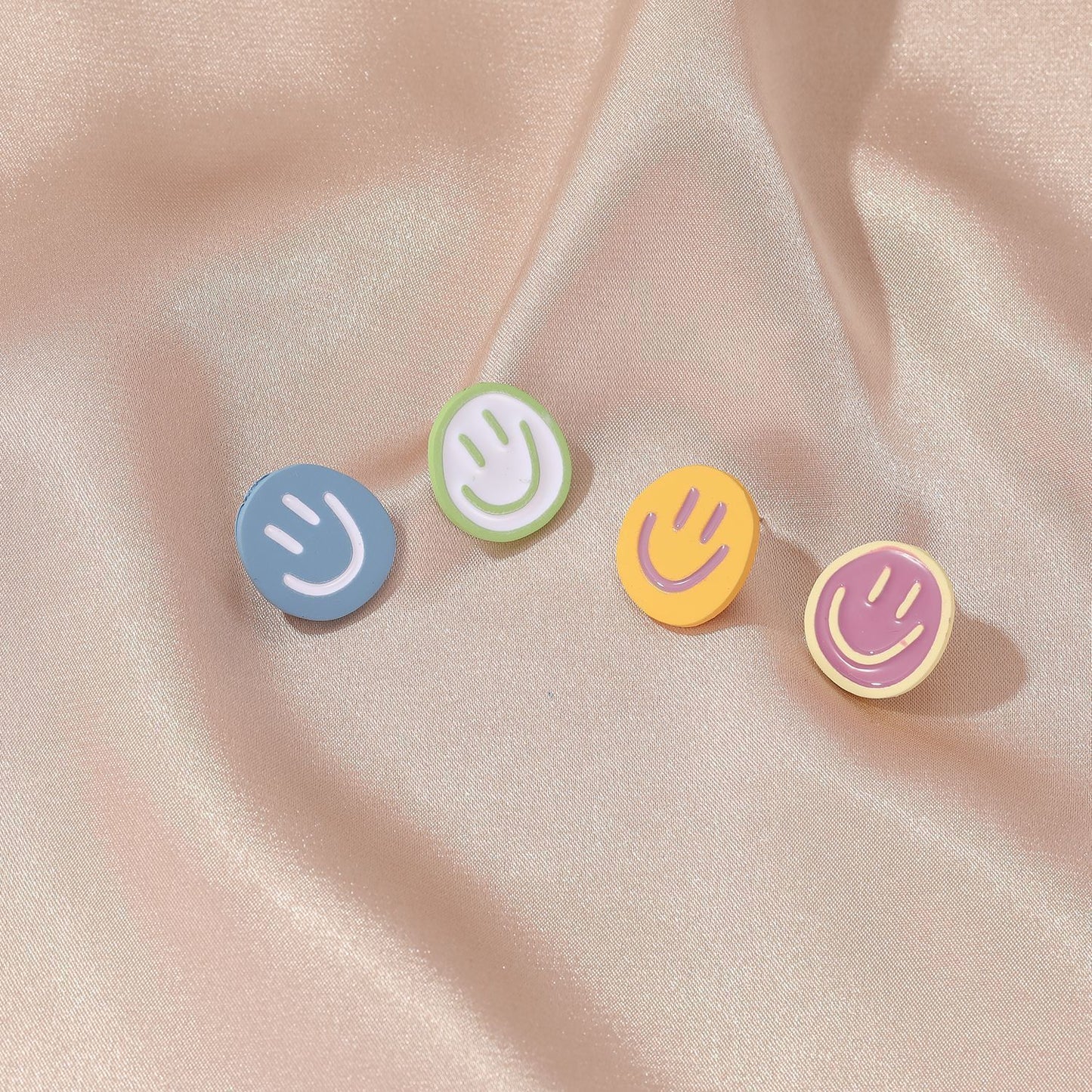 Sweet and cute round asymmetric smile earrings female ins fashion simple personality trend smile earrings