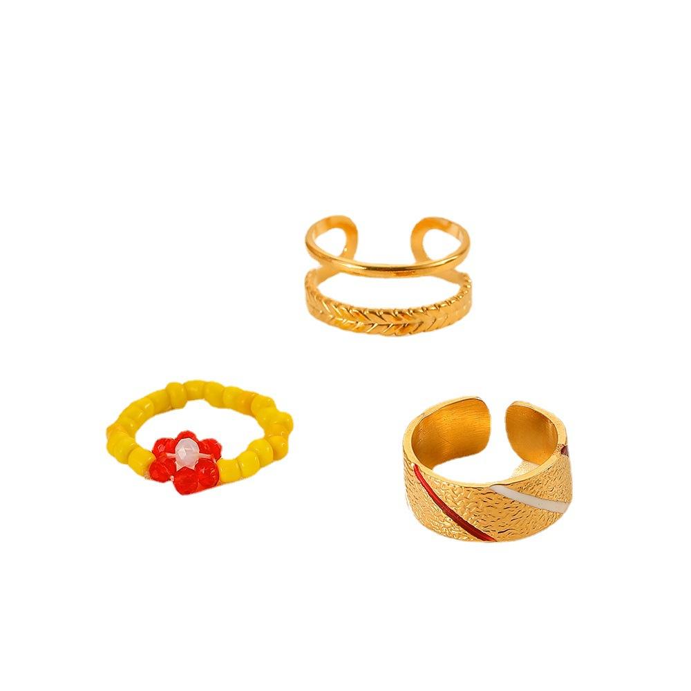 Light luxury niche fashion simple personality stainless steel handmade beads Shaohua wheat ears open ring set for women