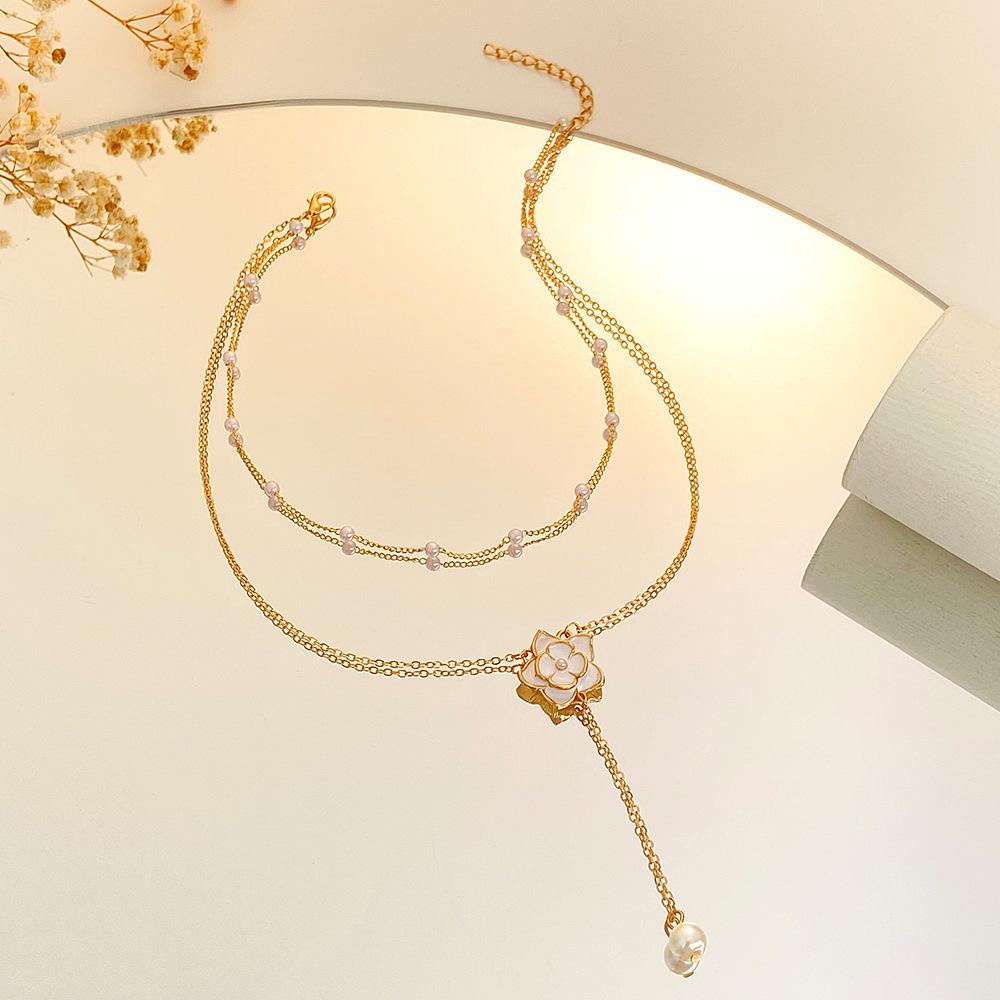 Ins double layered camellia necklace female fashion light luxury niche design pearl pendant sweater chain tide