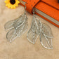 Fashion and personality explosion models hollow four leaves ladies earrings popular earrings stalls
