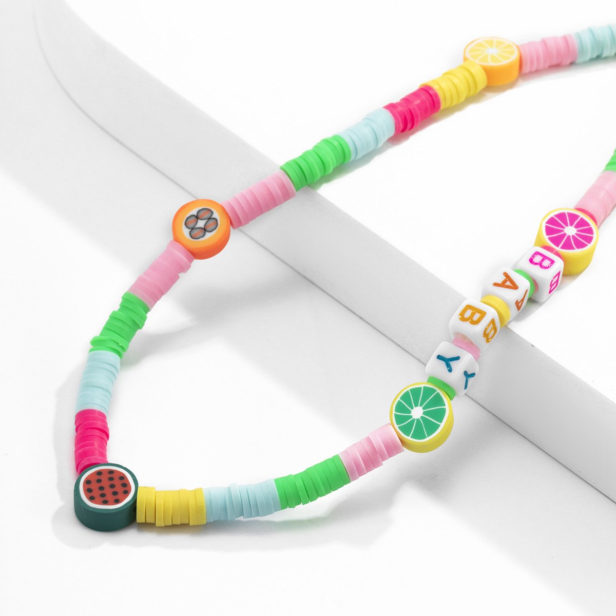 Creative summer multi-letter macaron color mobile phone chain holiday smiling face butterfly flower accessories female