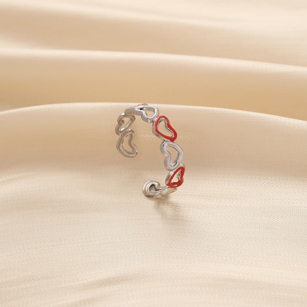 Small and exquisite women's stainless steel creative opening adjustable hollow heart ring