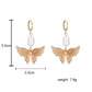 Niche fashion metal hollow multi-layer butterfly earrings temperament baroque freshwater pearl earrings women