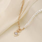 Fashionable and Exquisite Super Fairy Short Pearl Lock Heart Eye Necklace