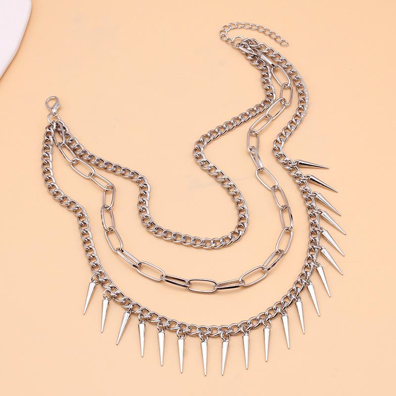 Cold and versatile titanium steel necklace men's trendy brand punk hip-hop tassel rivets light luxury clavicle chain women's pointed cone cone