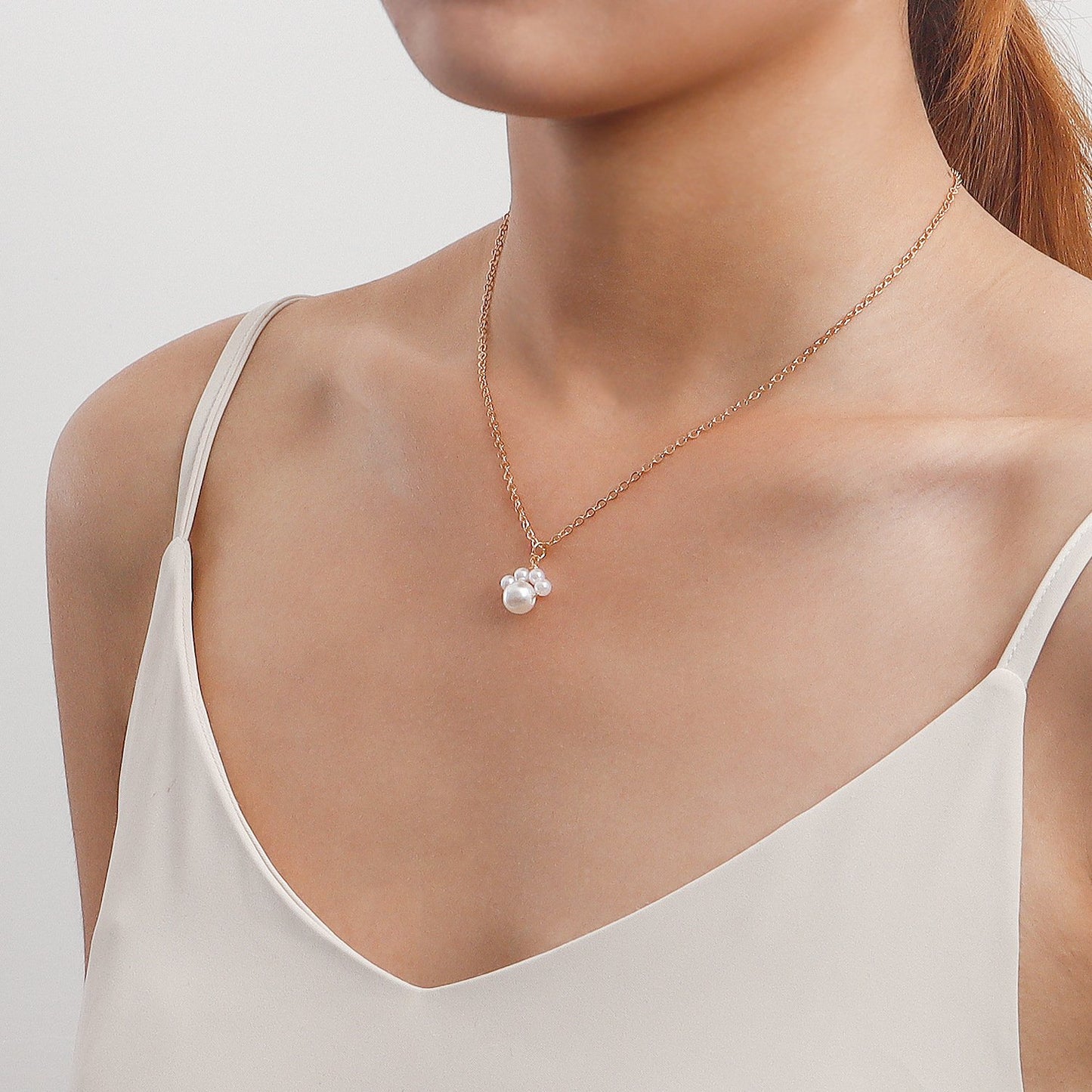 Jewelry ins simple creative dog footprints imitation pearl pendant necklace female minority design sense light luxury