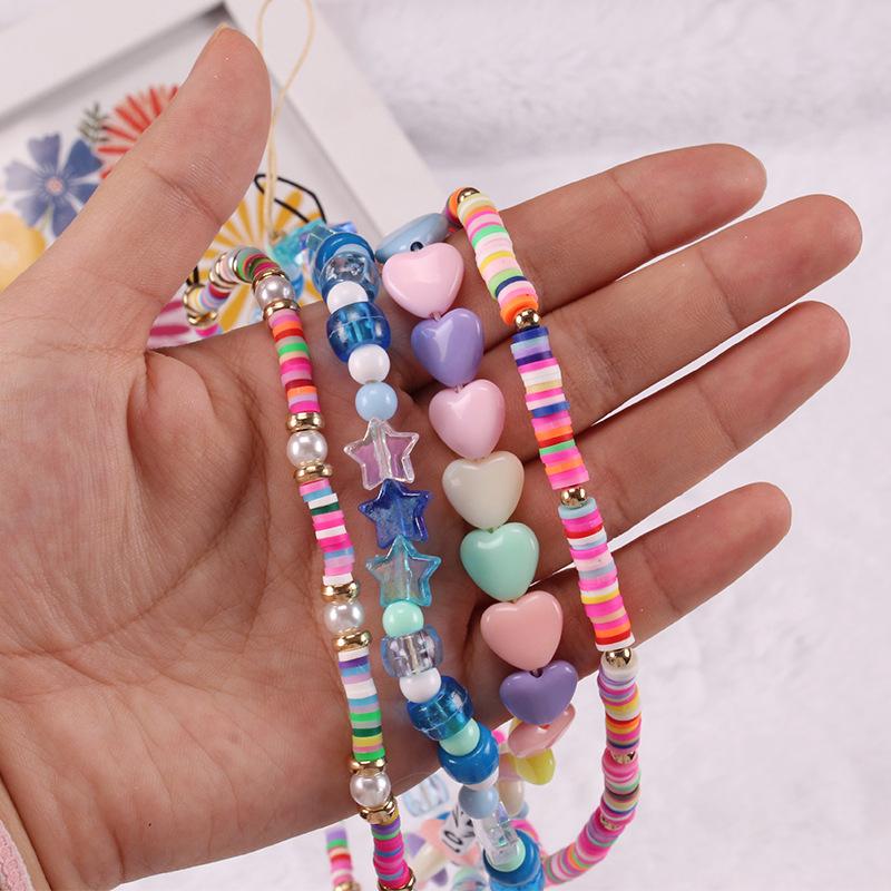 Simple Bohemian soft pottery peach heart mobile phone lanyard mixed color beads mobile phone chain female ornament