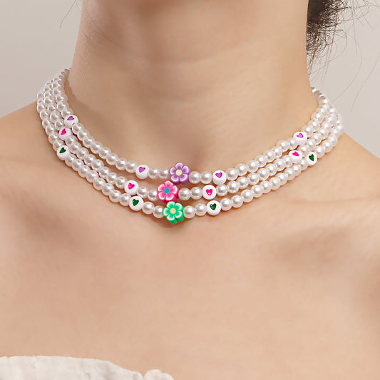 Jewelry ins soft pottery flower color love imitation pearl necklace female niche design light luxury