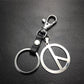 Quan Zhilong GD anti-war logo stainless steel key chain pendant cowhide connection piece Valentine's Day gift world peace