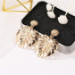 Fashion hollow leaf stud earrings national classic style