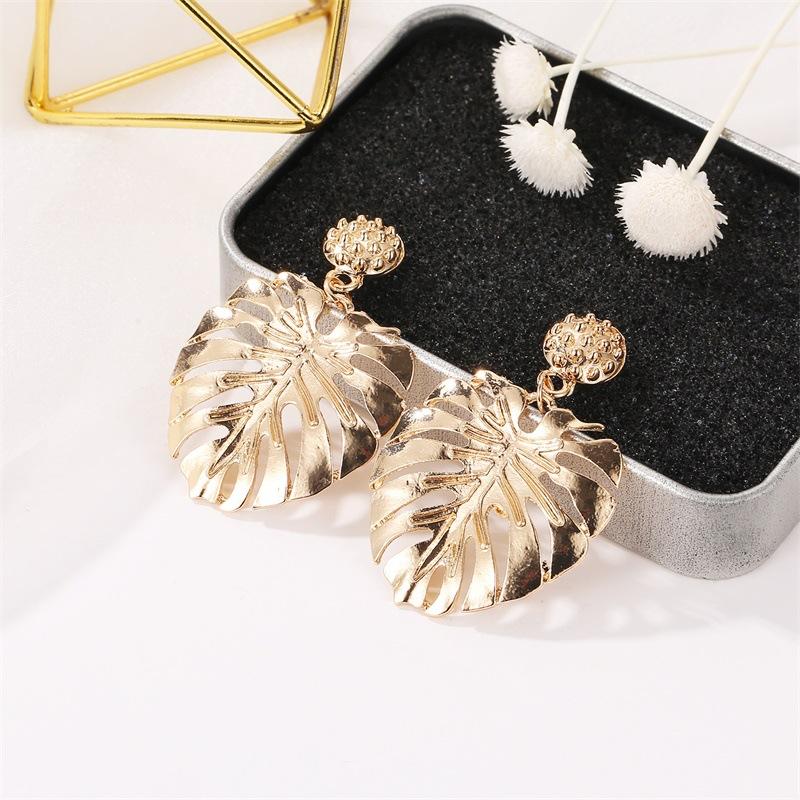 Fashion hollow leaf stud earrings national classic style
