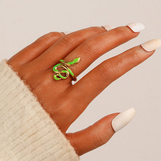 Trendy light luxury niche design green dripping oil snake-shaped stainless steel men's and women's rings