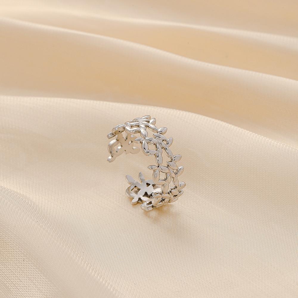 Trendy small fresh stainless steel opening hollow flower adjustable ring