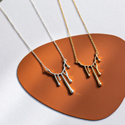 Cold and fresh water drop lava necklace female dark love earrings female minority design sense irregular heart-shaped earrings