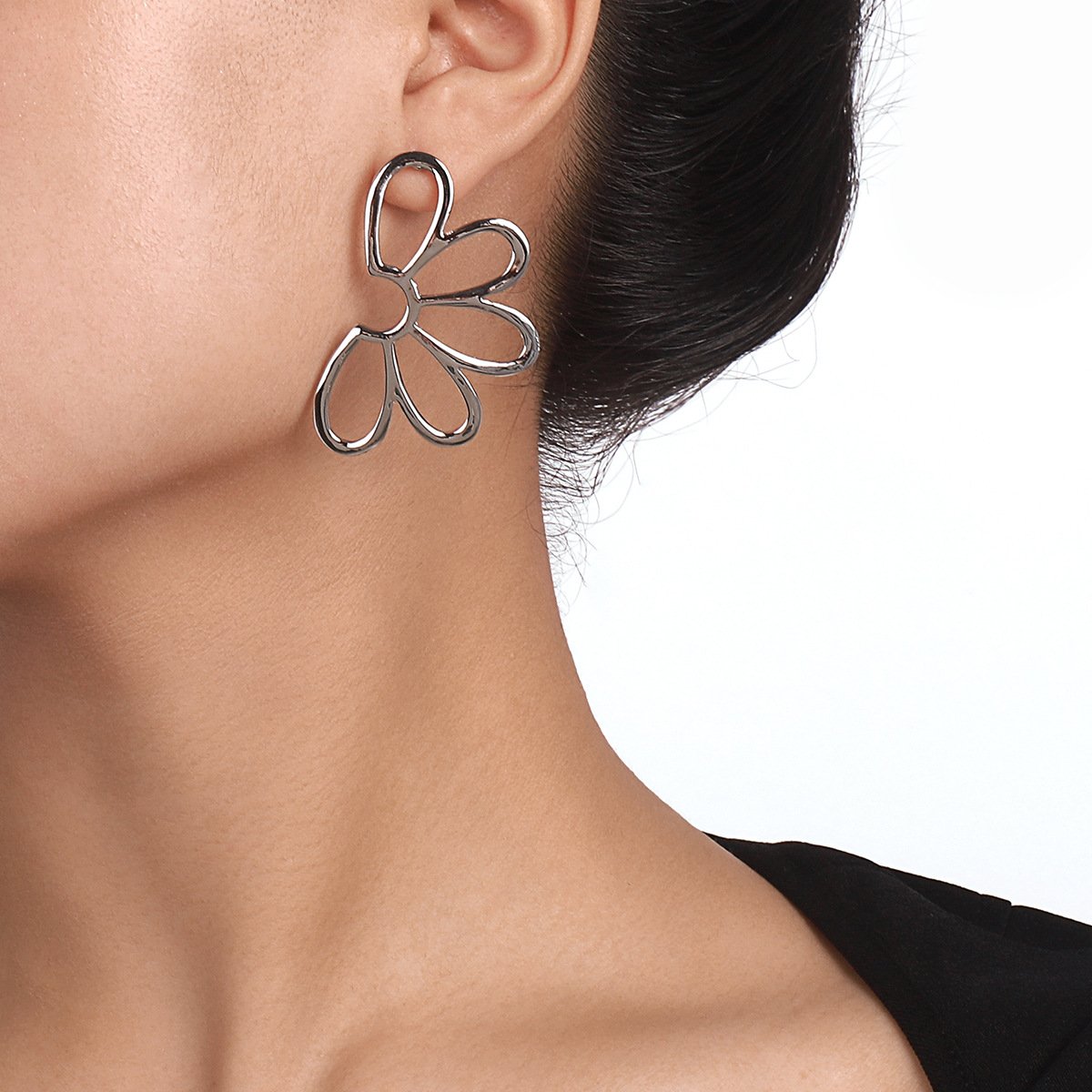 1499 Simple Fashion Earrings Hollow Flowers Symmetrical Geometric Earrings Alloy Niche Cold Earrings