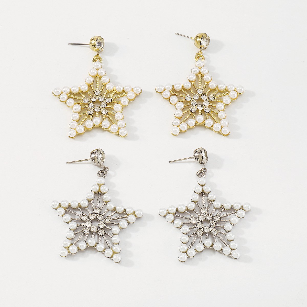 162 French light luxury romantic five-pointed star earrings pearl rhinestone hollow earrings net red geometric popular earrings