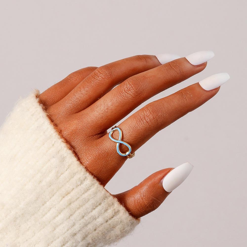 Simple, small and exquisite stainless steel creative design opening dripping oil 8 characters infinitely adjustable ring