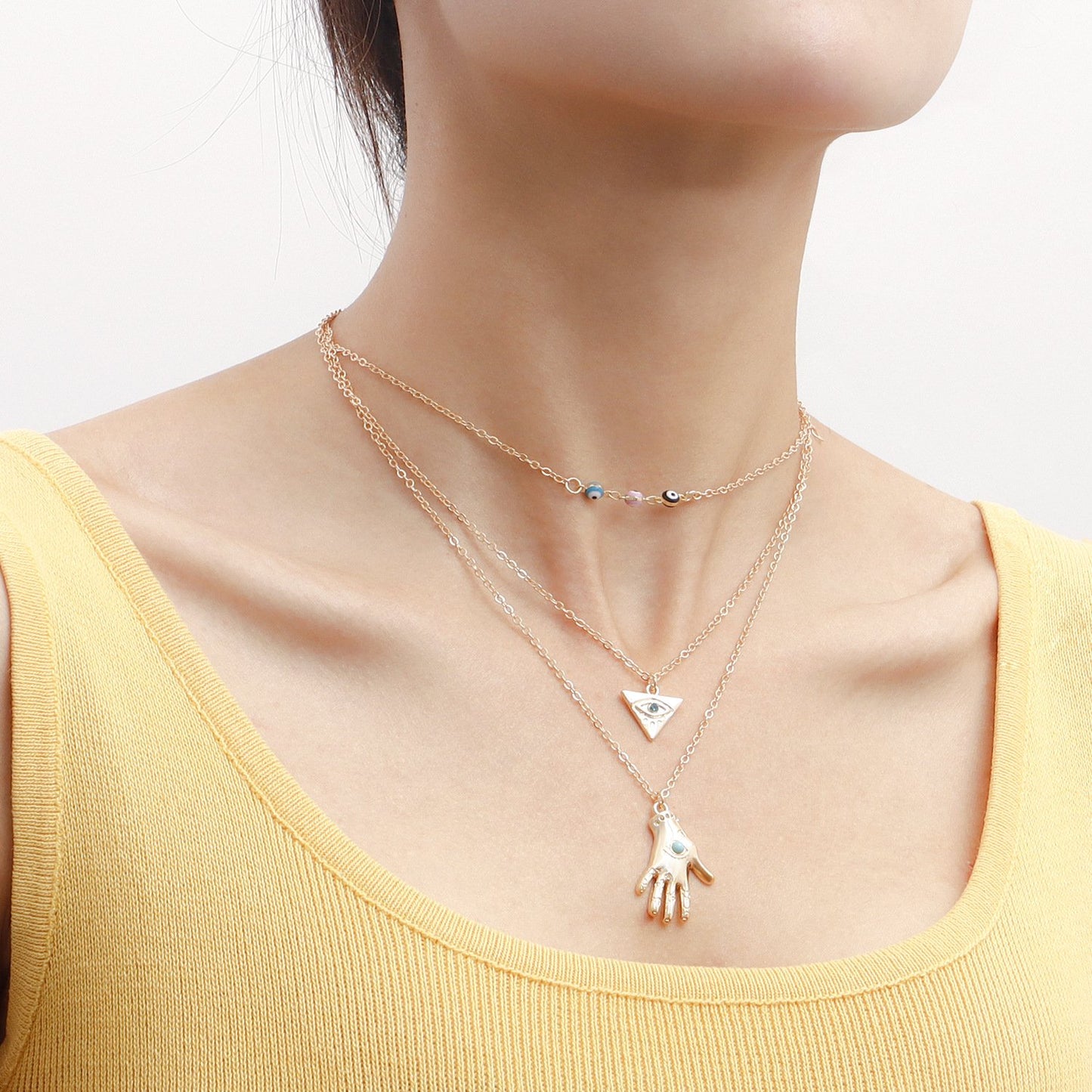 Accessories retro multi-layer devil's eye hand model necklace female jewelry niche high-end necklace light luxury