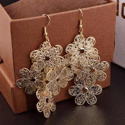 Long Hollow Plum Blossom Earrings Fashion Metal Sheet Lucky Earrings