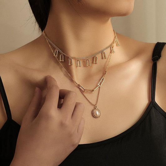 Fashion multi-layer U-shaped horseshoe tassel necklace personality oval pearl pendant clavicle chain jewelry female
