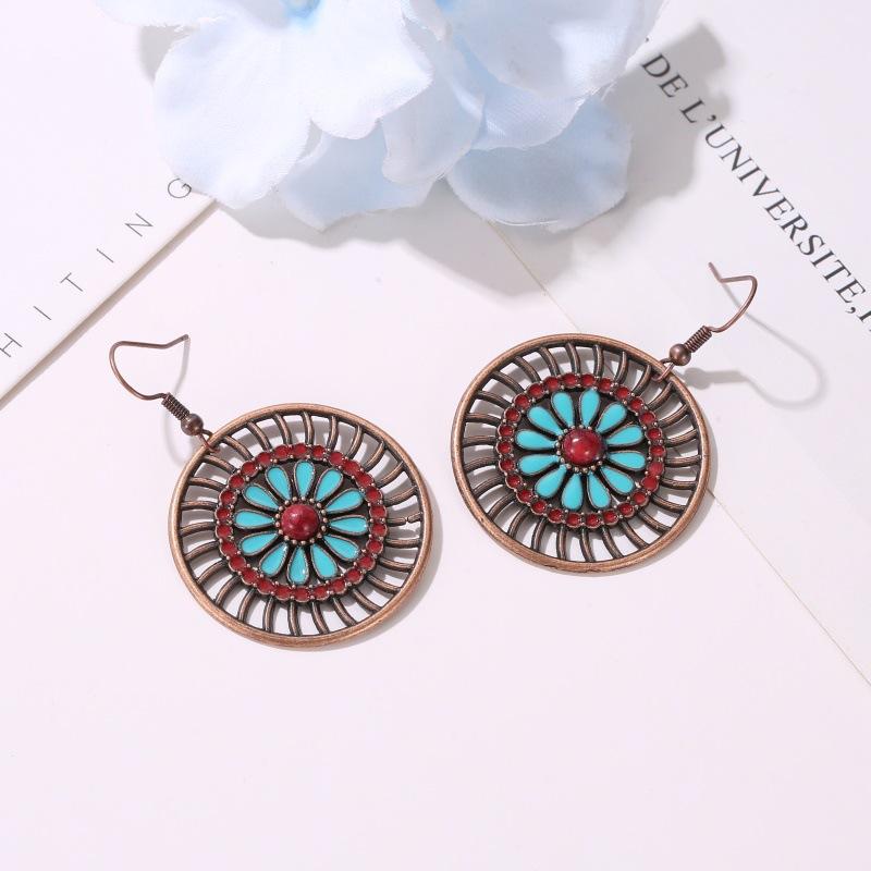 Ethnic personality earrings creative round hollow earrings female bohemian fashion retro flower earrings