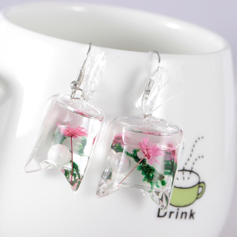 Creative transparent candy ocean conch earrings female personality resin dried flower plant earrings jewelry