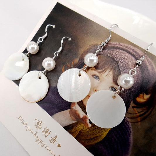 Natural round shell earrings simple pure handmade retro temperament female pearl earrings second hair Aqin same style